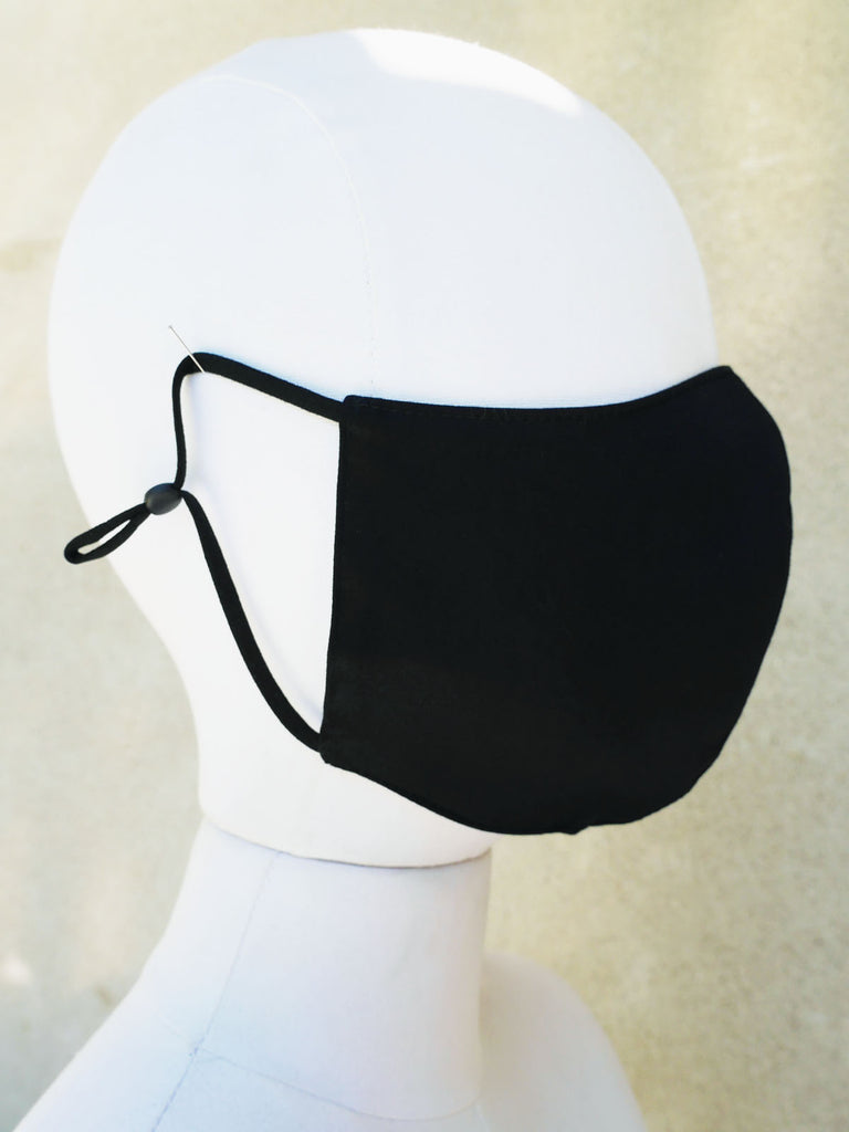 full face coverage mask- black color mask - soft ear loops with toggles - elastic loops - strong cotton filter - two layers of protection - light weight material - made in Canada 